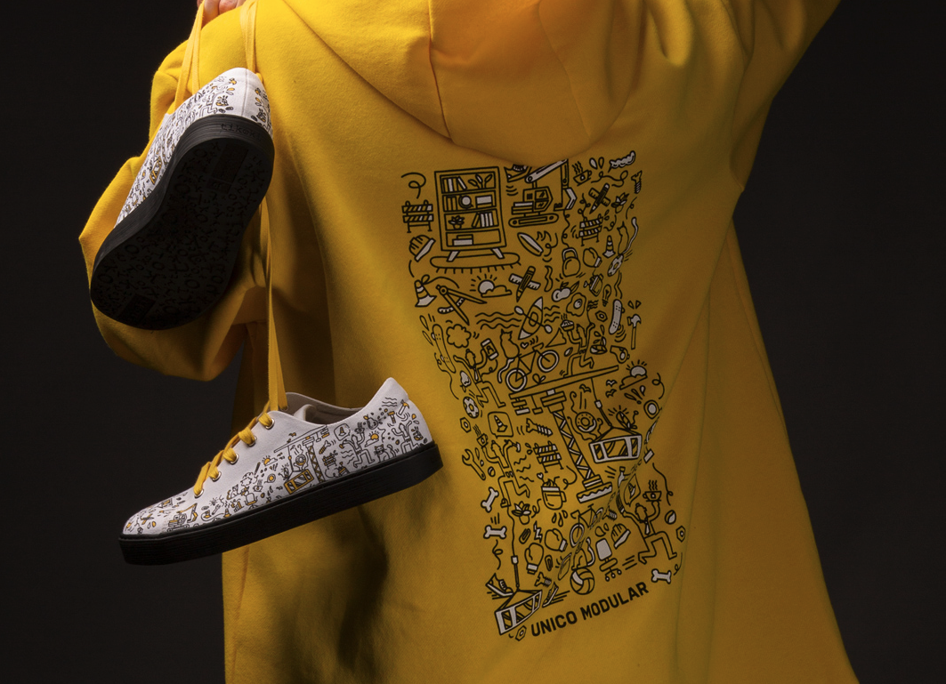 Unico Modular branded hoodie and sneakers
