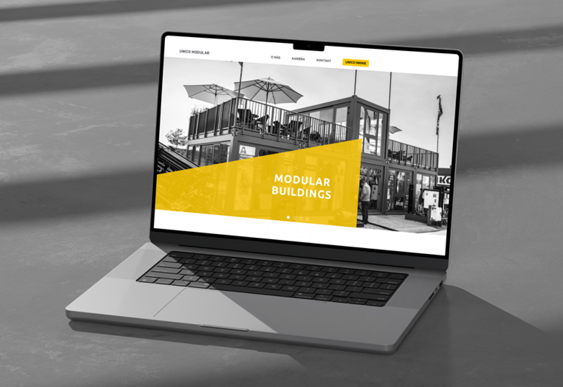 Unico website displayed on Macbook